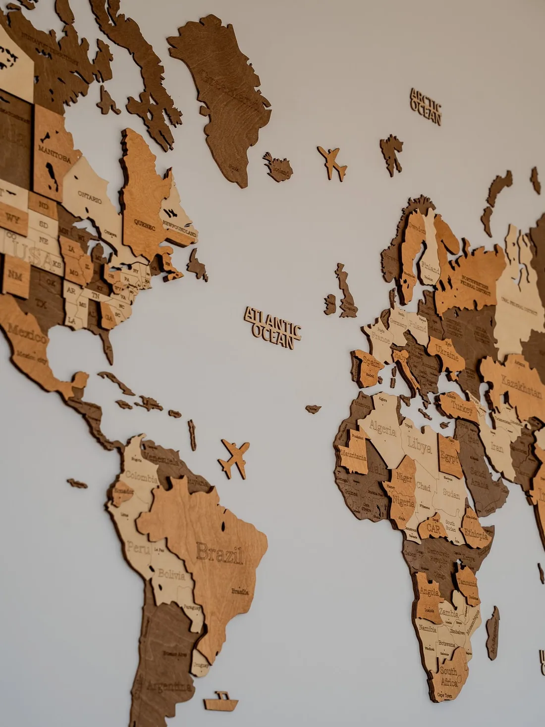 The wooden world map inside the dining room