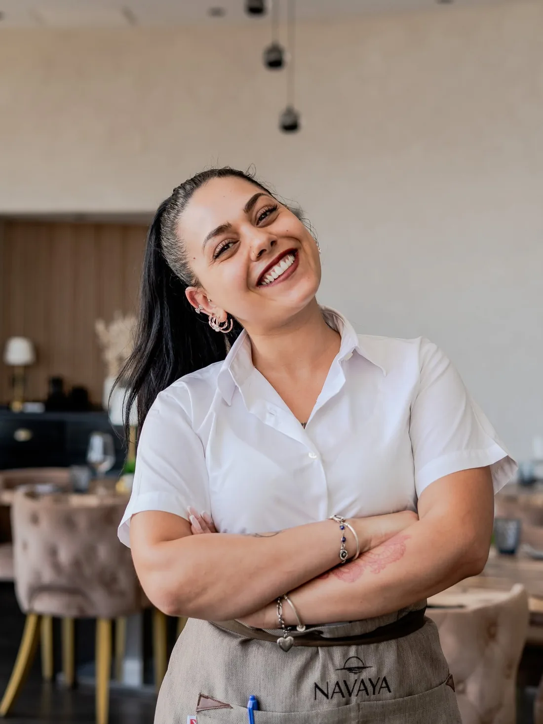 A member of the Navaya team in the dining room