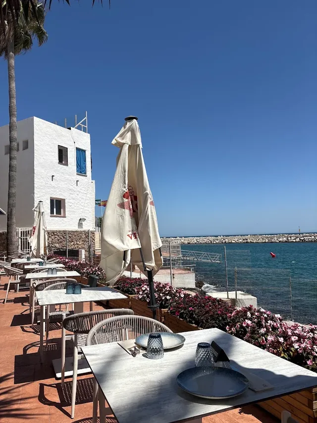The Navaya terrace above the rocks, looking across the bay